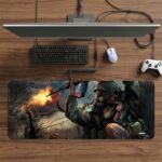 ARNA military shooter artwork of an army commander soldier sitting in cover and firing a gun extended large desk mat.